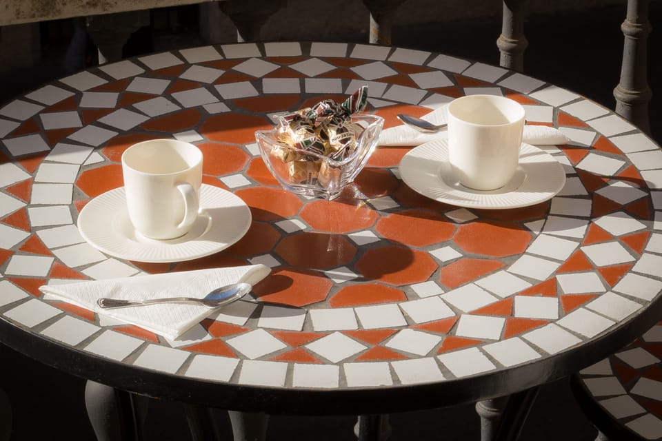 Let's have an Italian coffee at the balcony