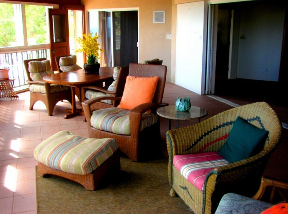 Relax on the screened in porch which looks out to Hart Bay view
