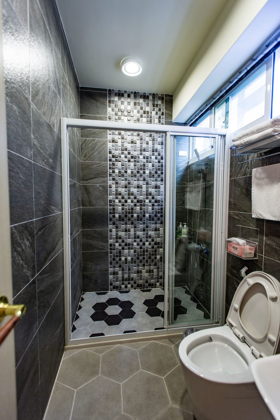 Shower, free toiletries, hair dryer, slippers