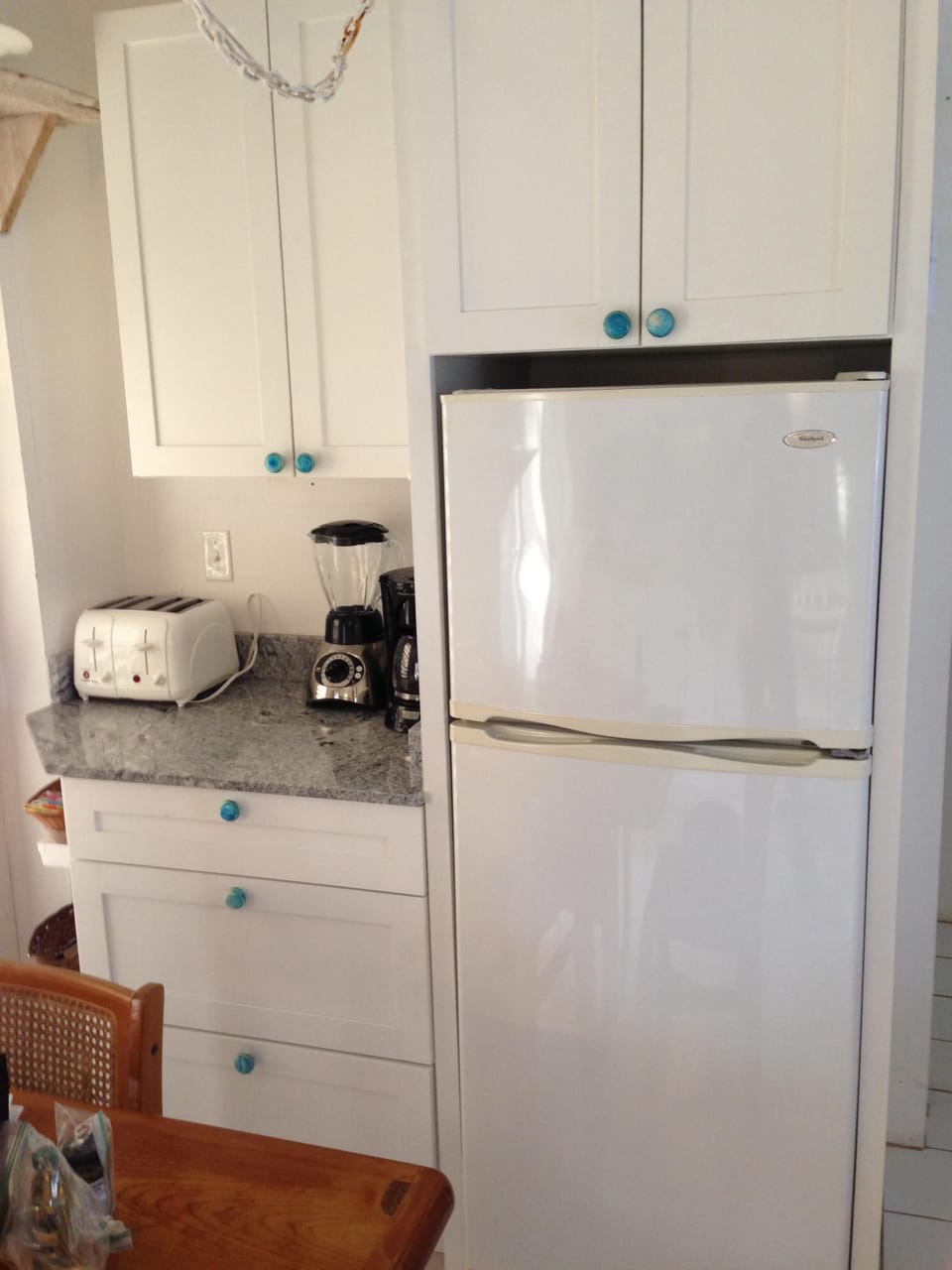 Coffee maker, blender, toaster, and of course a fridge!