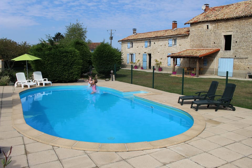Heated 10m x 5m gated pool and sun terrace with loungers