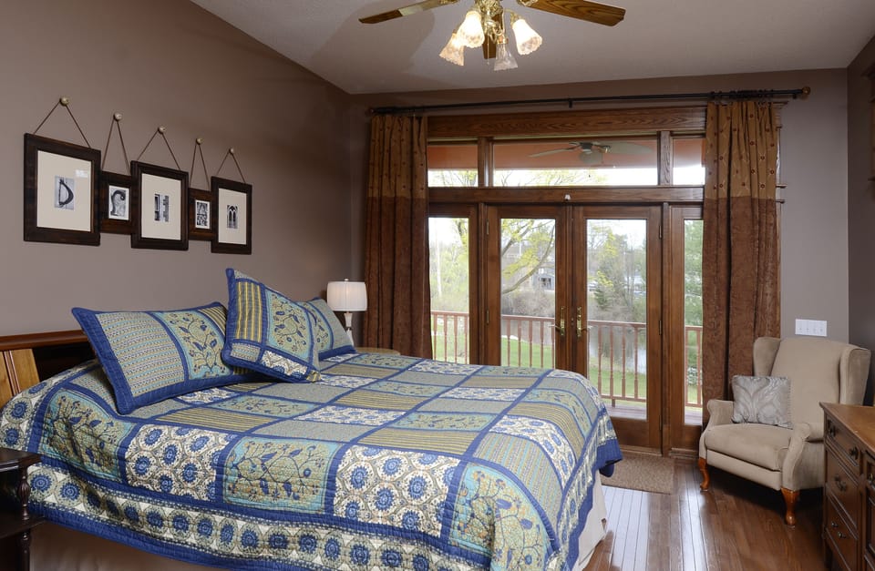 Master bedroom with back deck entrance. 