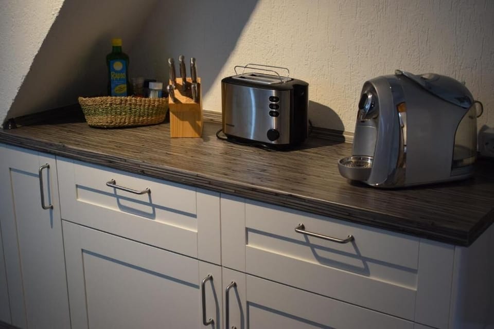 Apartment, 1 Bedroom | Private kitchen | Coffee/tea maker, electric kettle, highchair, mixer