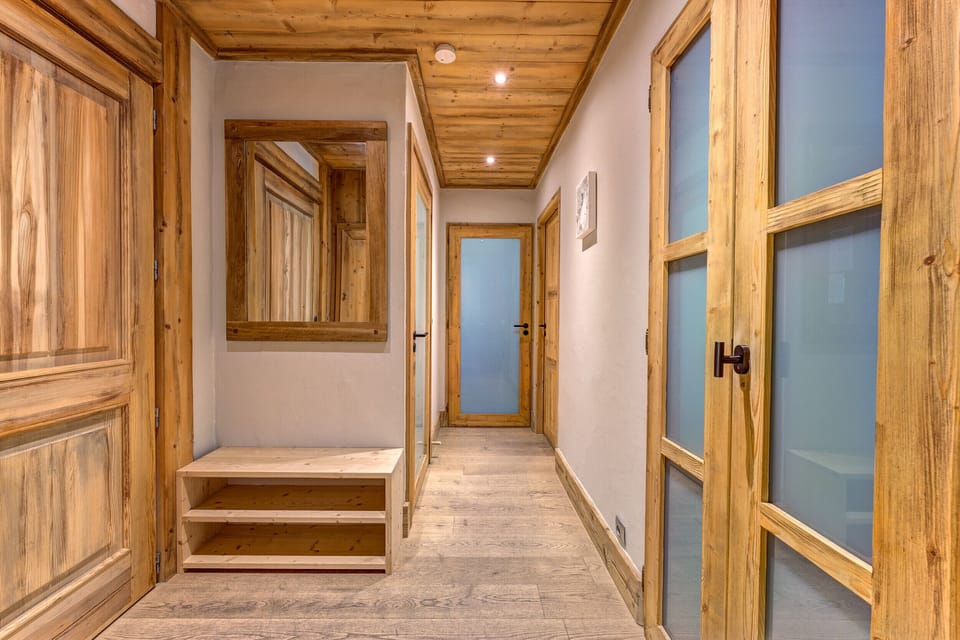 Beautiful carpentry throughout providing storage