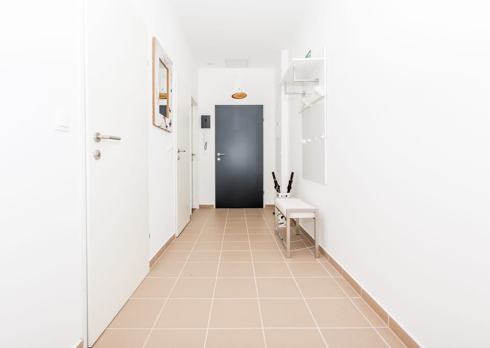 Entrance area and the view to the bedroom and WC + Bathroom