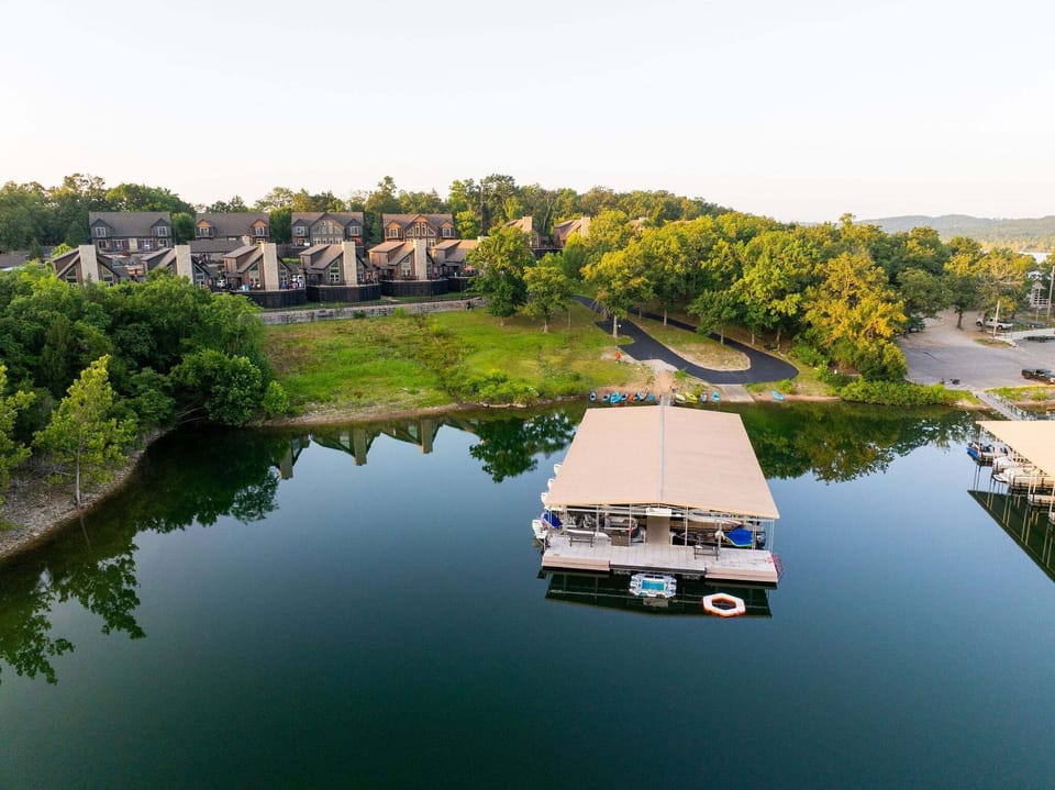 Our private resort dock has boat slips, free fishing poles, kayaks,  canoes and pontoon boat rental