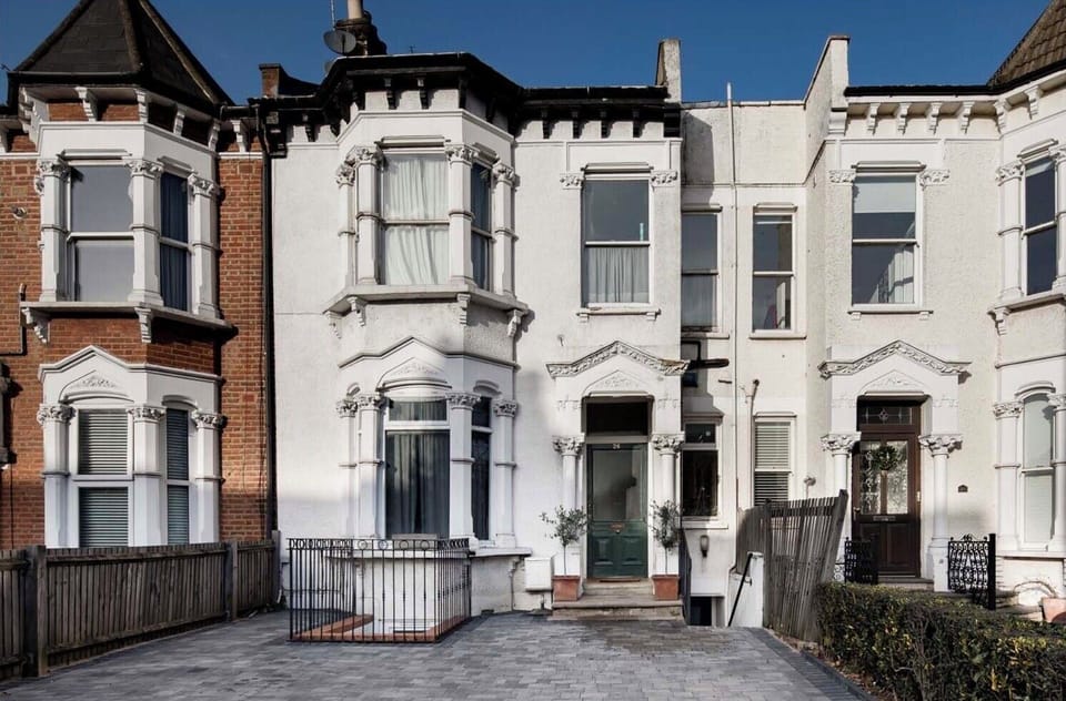 The house in East Finchley, the apartment is on the top two floors