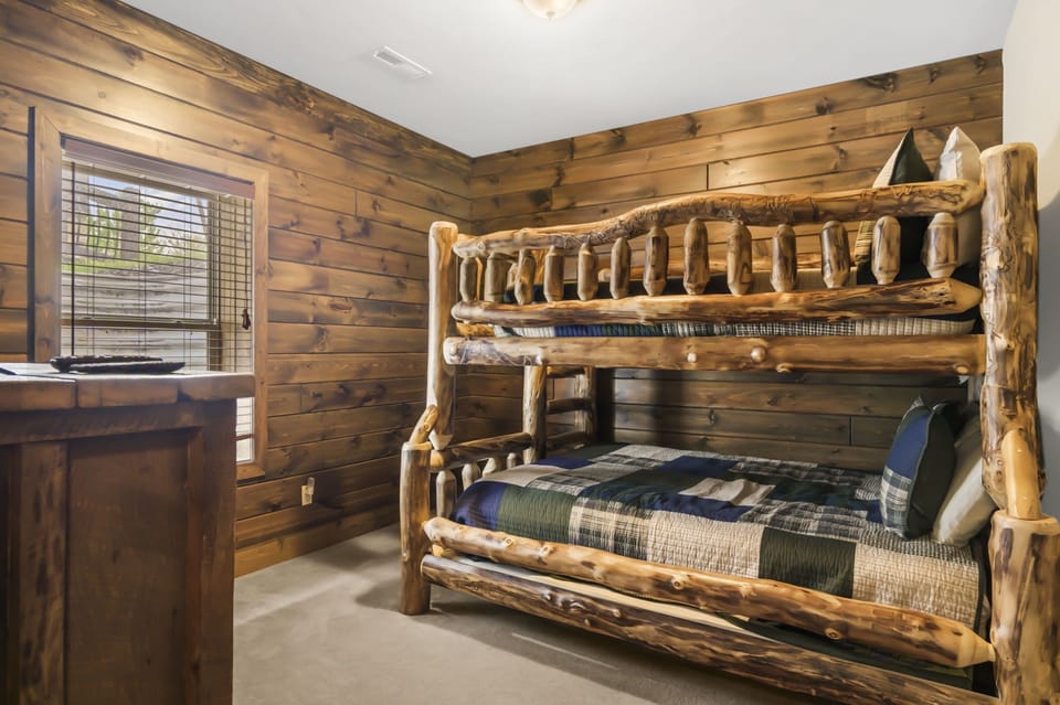 Lower level bunk room with full over queen bunkbed