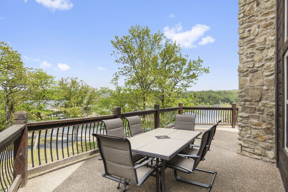 Dining on the main level deck with a great view of the lake