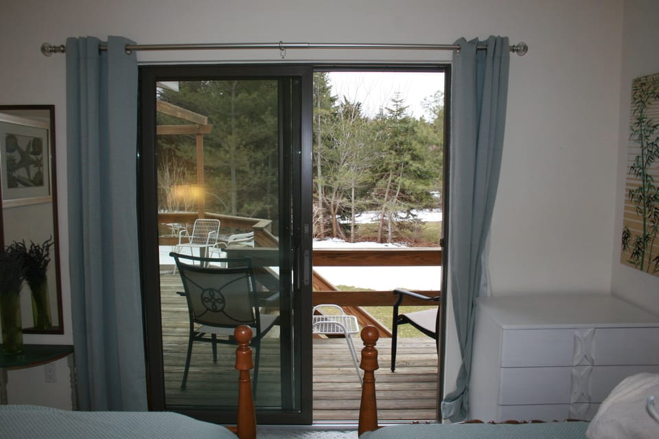 Slider to deck from back bedroom