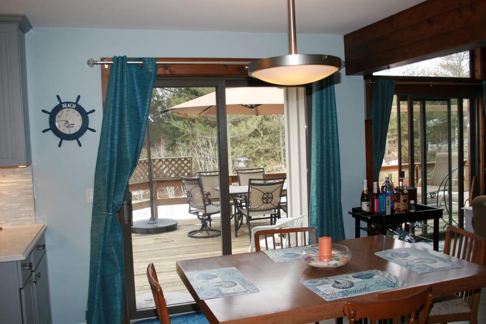 Dining area with sliders to deck