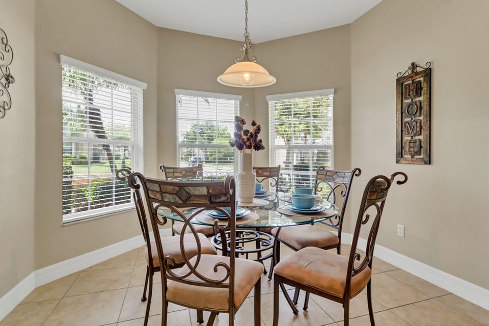 Enjoy your coffee overlooking luscious palm trees & landscape.