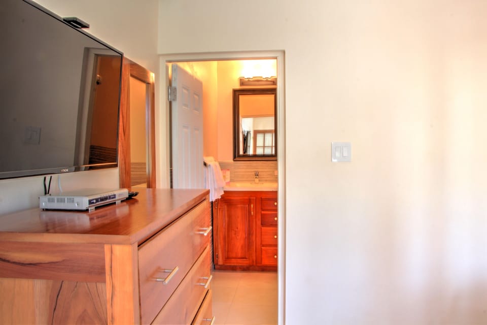 bedroom 3 40-inch TV plus looking into bathroom