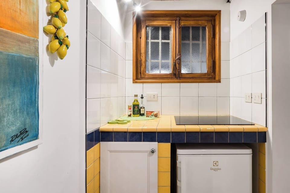 kitchen with window and fridge
