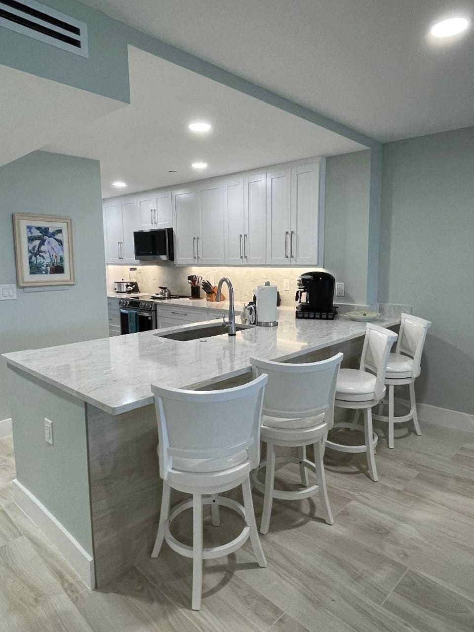 Kitchen Counter area with plenty of Seating. Regular and Keurig Coffee Makers.