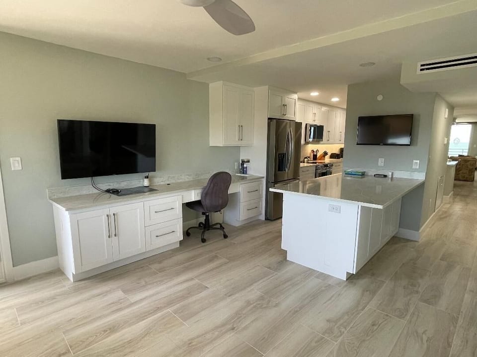 Den area with computer area, 2 TV's, Wi-Fi, and printer. Just bring your Laptop!