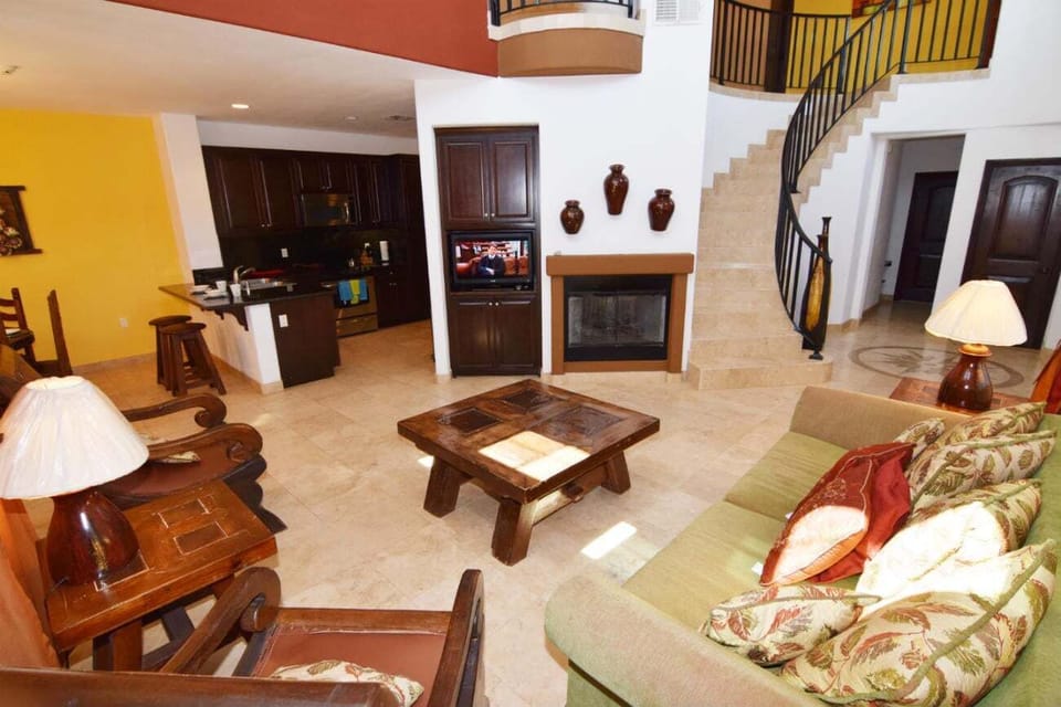 Open-concept layout connecting living room, dining area, and kitchen — perfect for group gatherings .