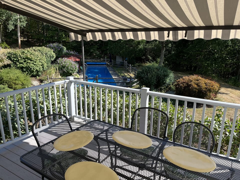 On deck, outdoor table for seating 6 to 10 people
