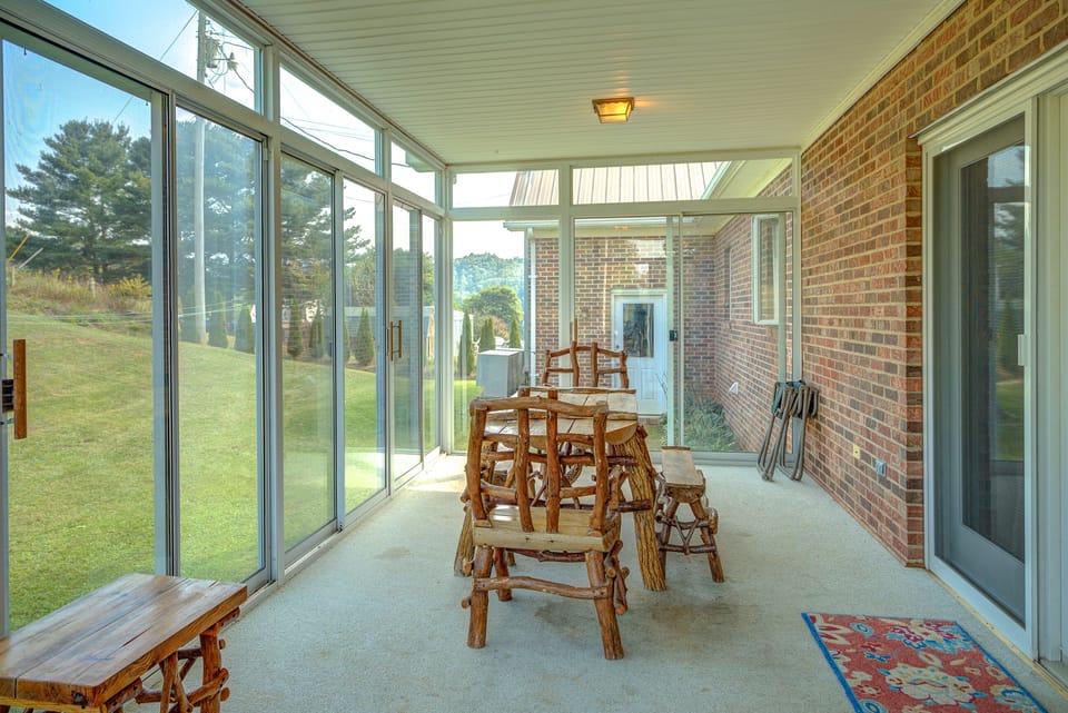 A beautiful Sun room with a 6-8 person table!