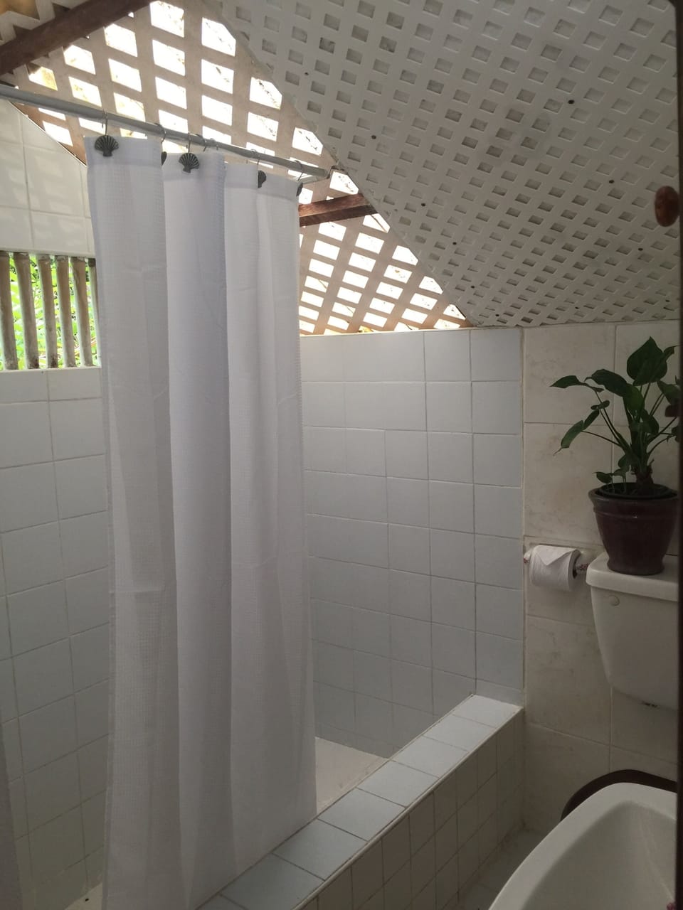 Semi-garden private bathroom with solar powered hot water