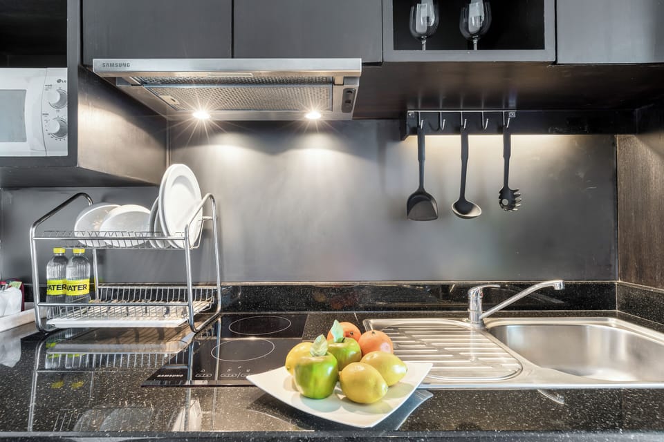 Grand Residence Suite | Private kitchen | Coffee/tea maker, electric kettle, eco-friendly cleaning products