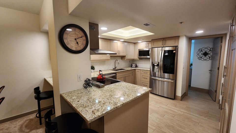 Kitchen:  Stainless appliances, granite counter-tops, fully stocked kitchen ware