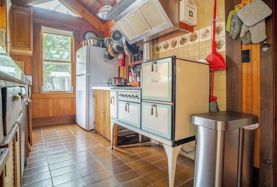 West wall of kitchen with historic Wedgewood stove