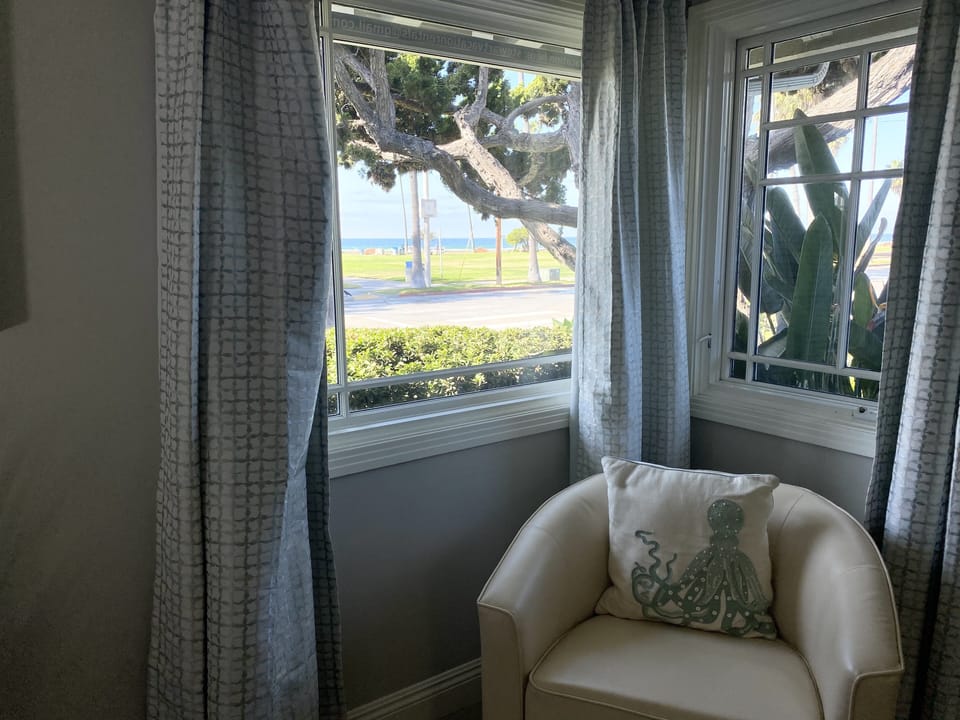 Ocean view and cozy seating area in 2nd bedroom.