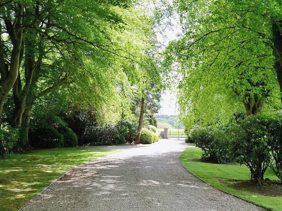 The cottage is hidden away at the foot of a long driveway with parking for two cars | Dunlappie Lodge, Edzell, near Brechin