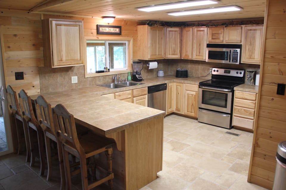 Modern kitchen with stainless steel appliances