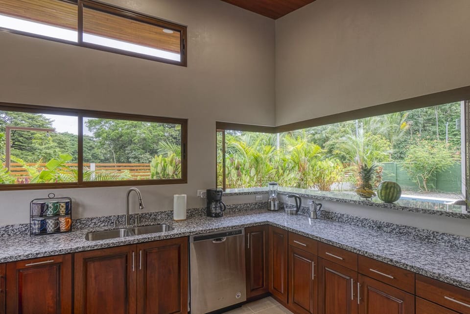 Pass-through window from the kitchen to the pool bar
