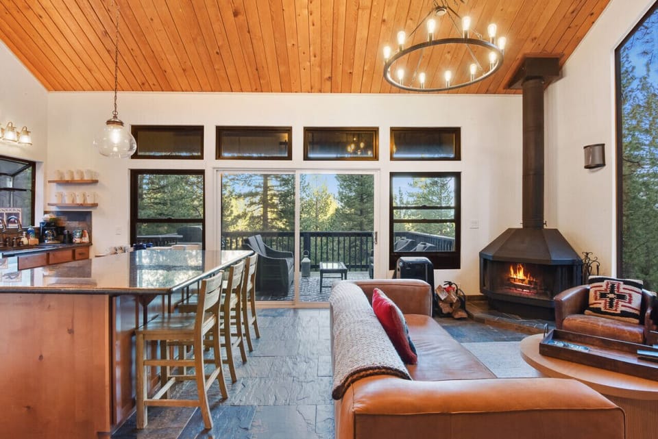 Living, Kitchen and deck with peek lake views.