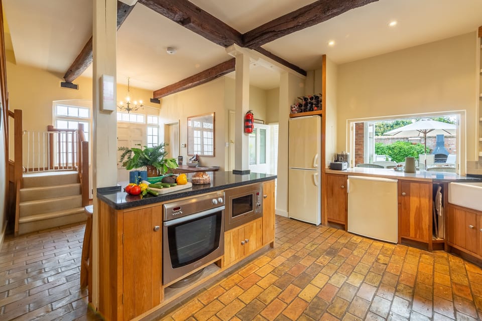 Ground floor: Kitchen with stairs to first floor