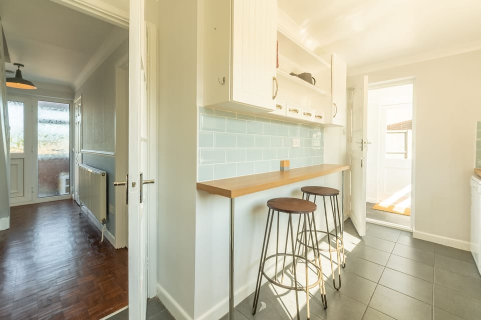 Ground floor: Bar seating in the kitchen