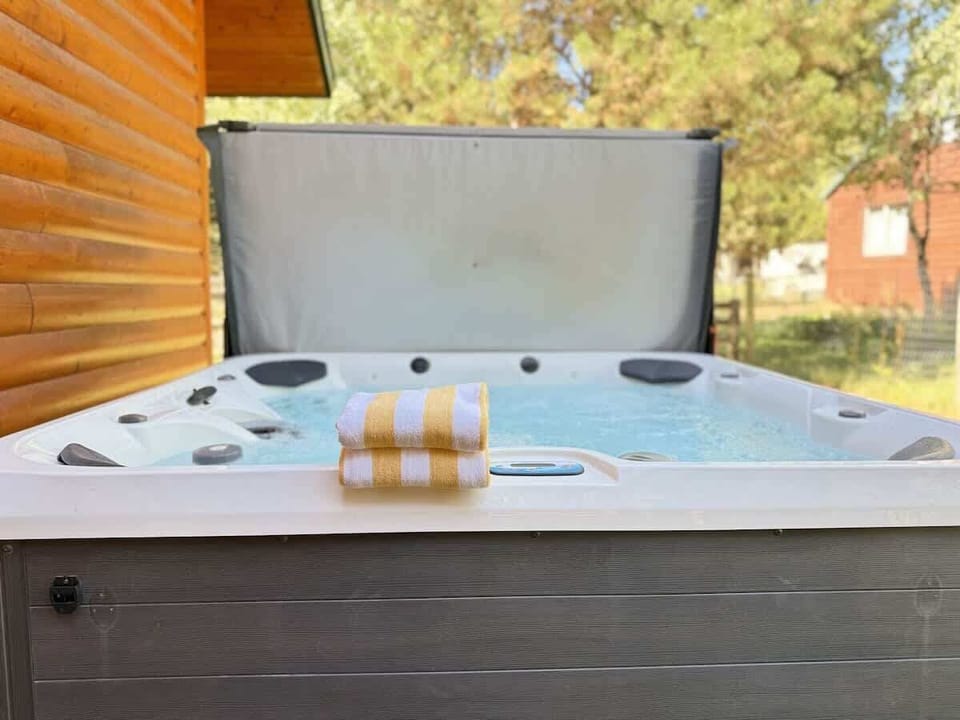 Hot tub for relaxing after a long day exploring the area.