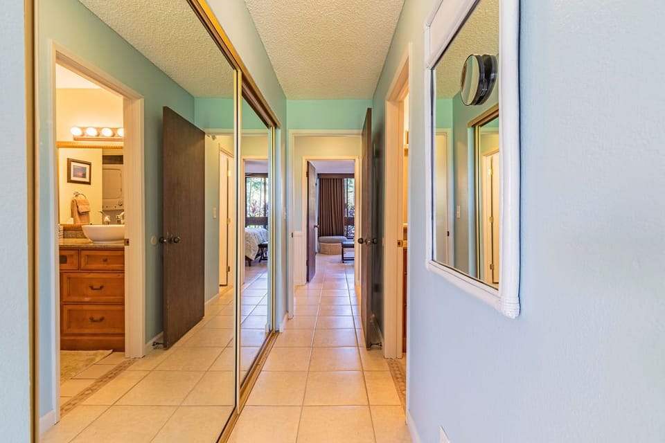 A hallway between bedrooms - two separate bathrooms plus doors between bedrooms!