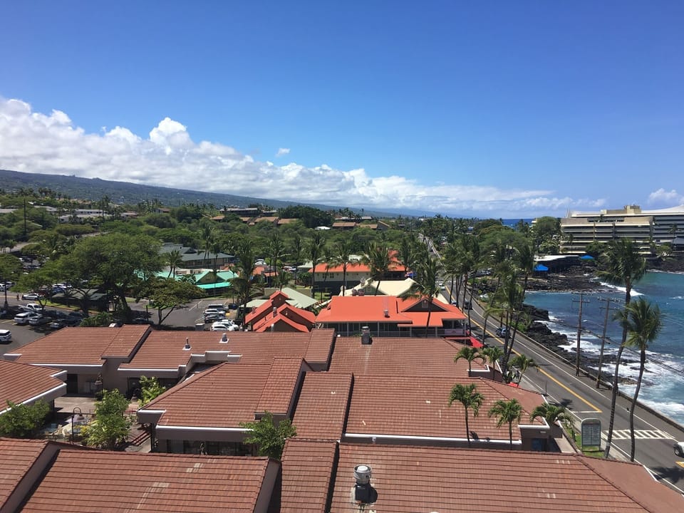 View of ocean, mountains and Alii Drive from 2nd floor lanai.