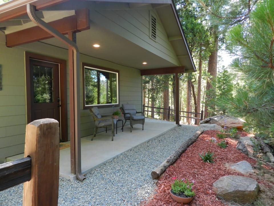 Porch seating with views of surrounding mountains