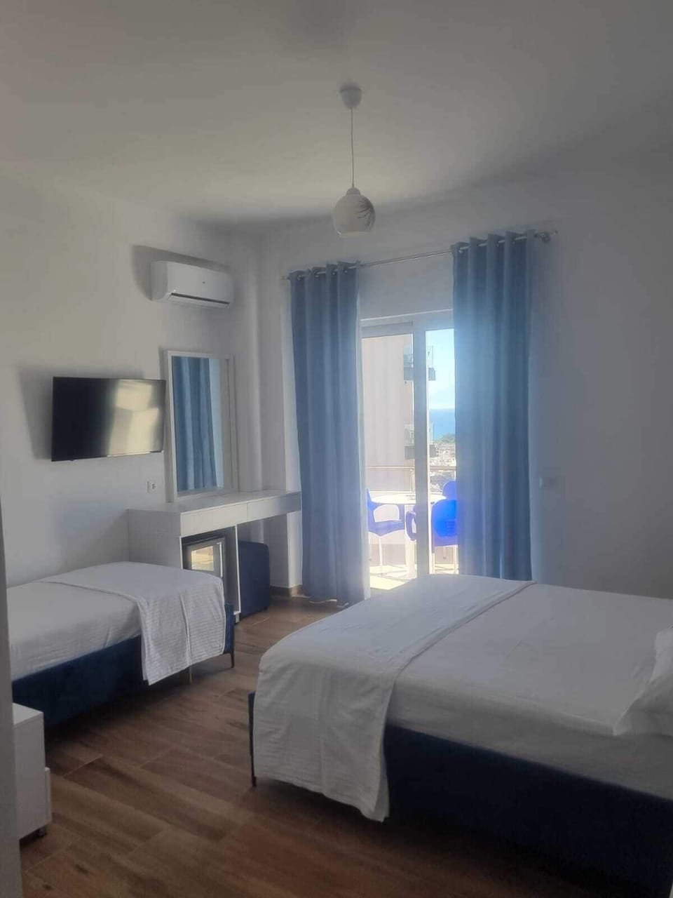 Deluxe Triple Room, Balcony | Premium bedding, desk, blackout drapes, soundproofing