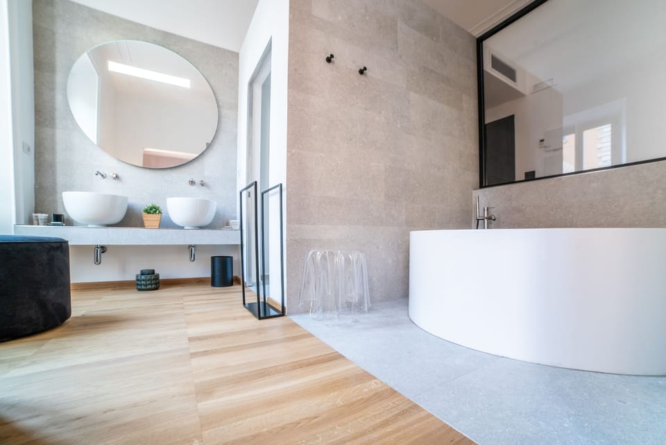 Combined shower/tub, free toiletries, hair dryer, slippers