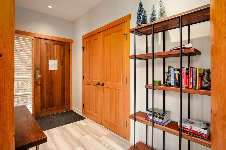 Welcoming entryway with storage for boots and gear.