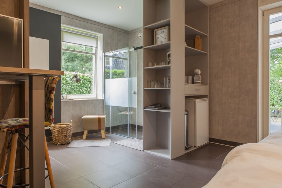 Room, Garden Area | Iron/ironing board, free cribs/infant beds, rollaway beds, free WiFi