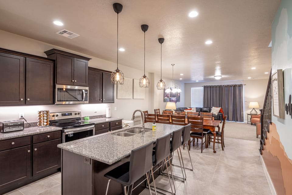 Kitchen Island - The Kitchen Island comfortably seats 4 adults and creates a great space for serving and preparing meals.