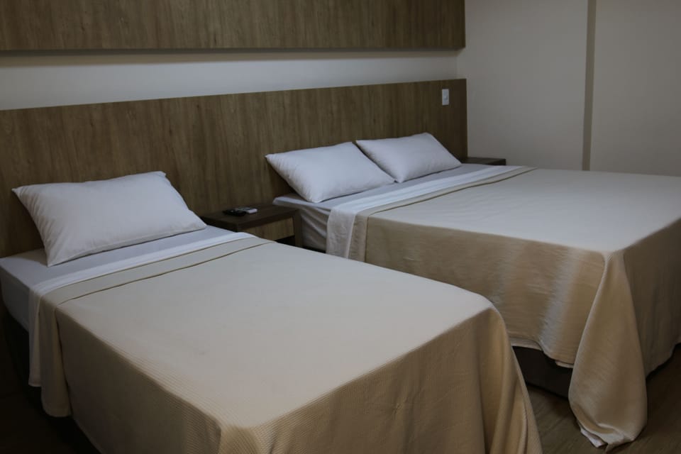 Standard Triple Room | Minibar, desk, blackout drapes, free WiFi