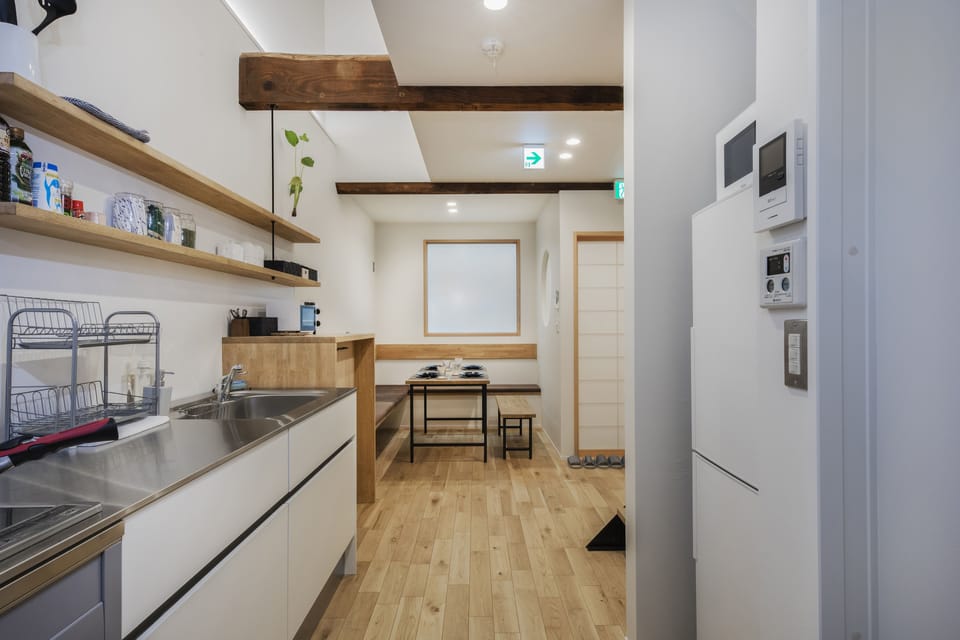 Japan Sessions KANZAKI 01 | Living area | 55-inch flat-screen TV with digital channels