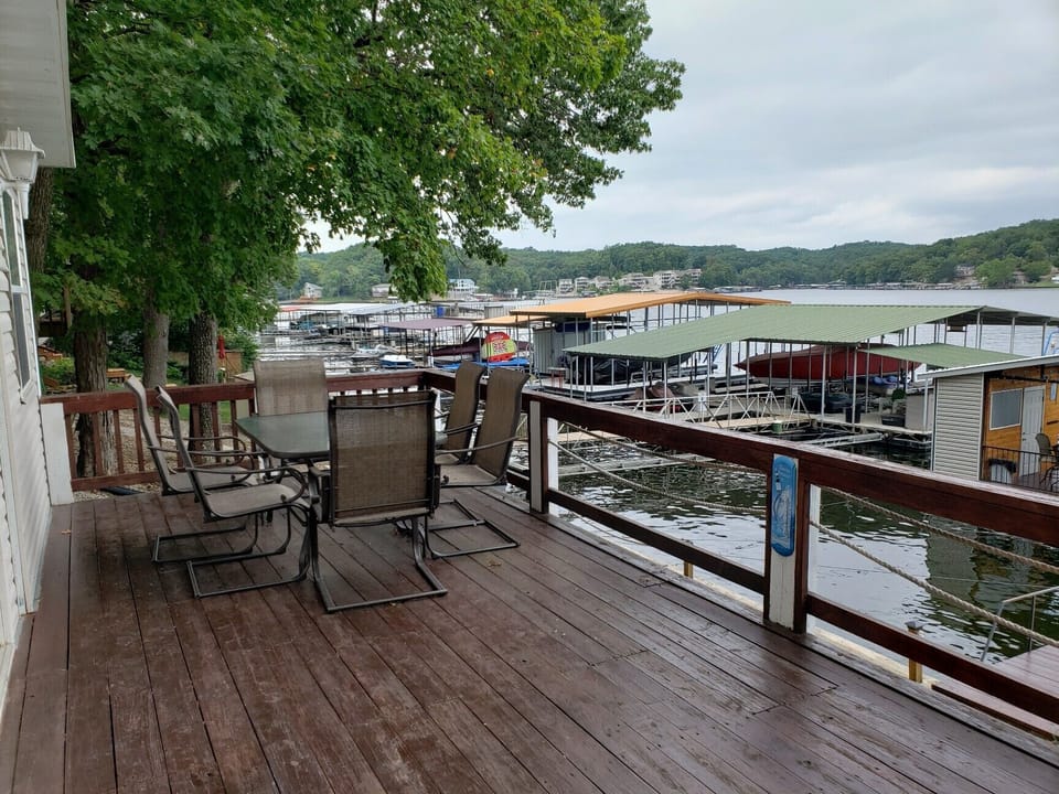 Propane grill on this deck, charcoal grill on martini deck (concrete pad).