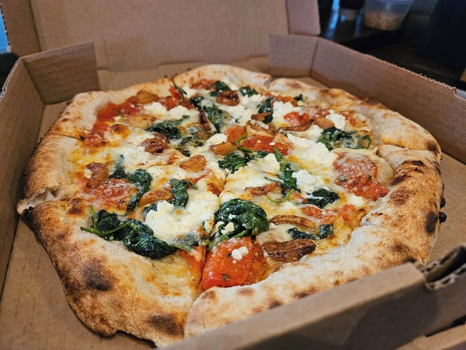 Pizza, beer and pastries just across the road.