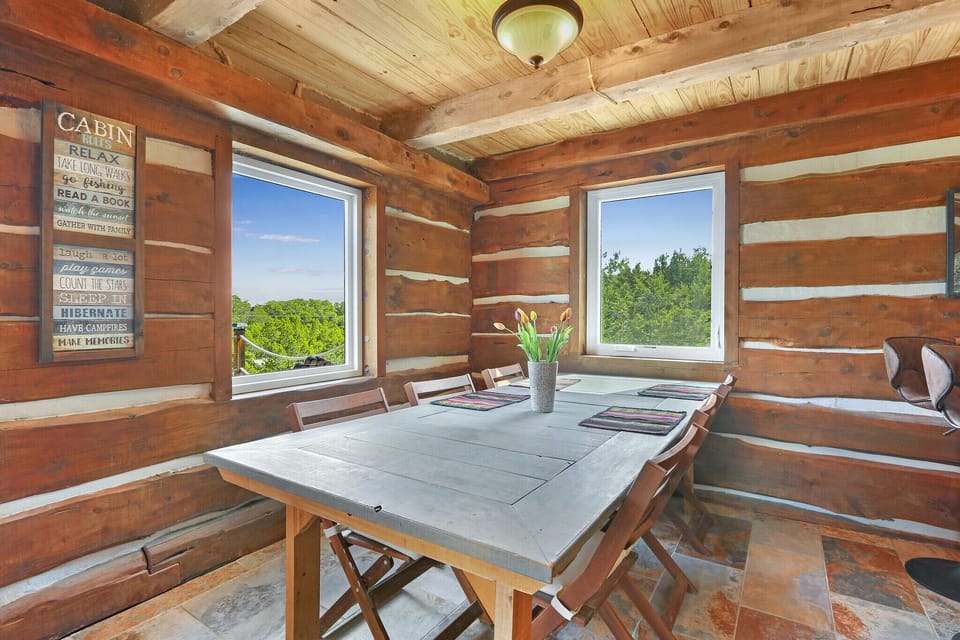 The large dining table offers plenty of seating to enjoy a meal with company