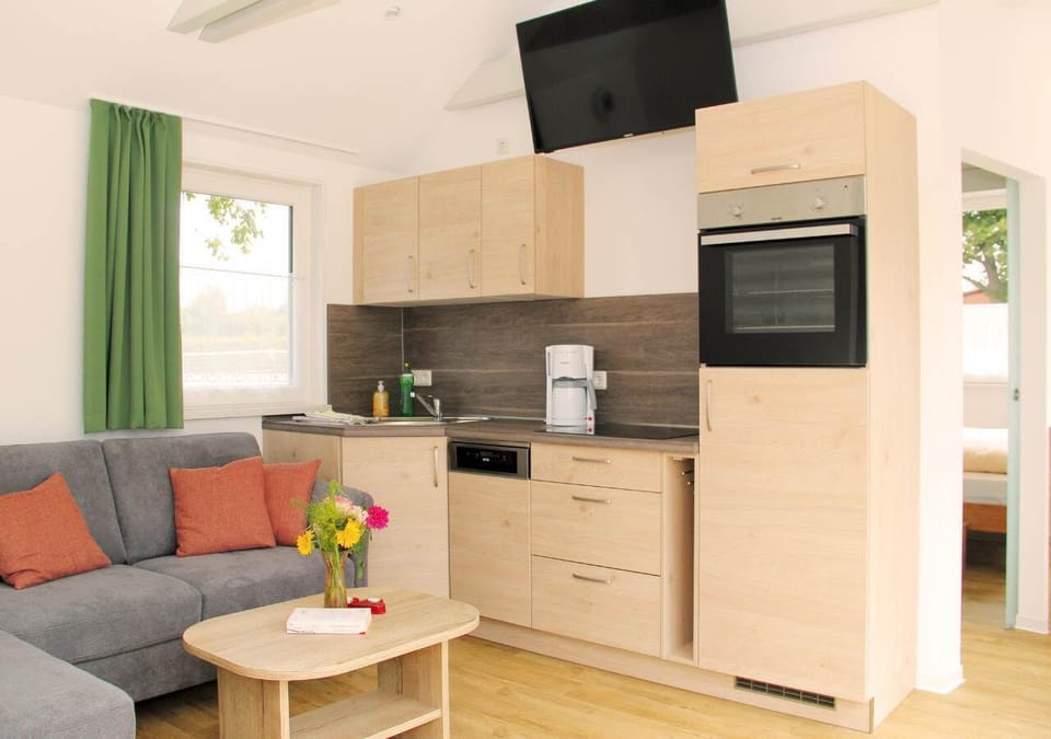 Fridge, stovetop, dishwasher, coffee/tea maker