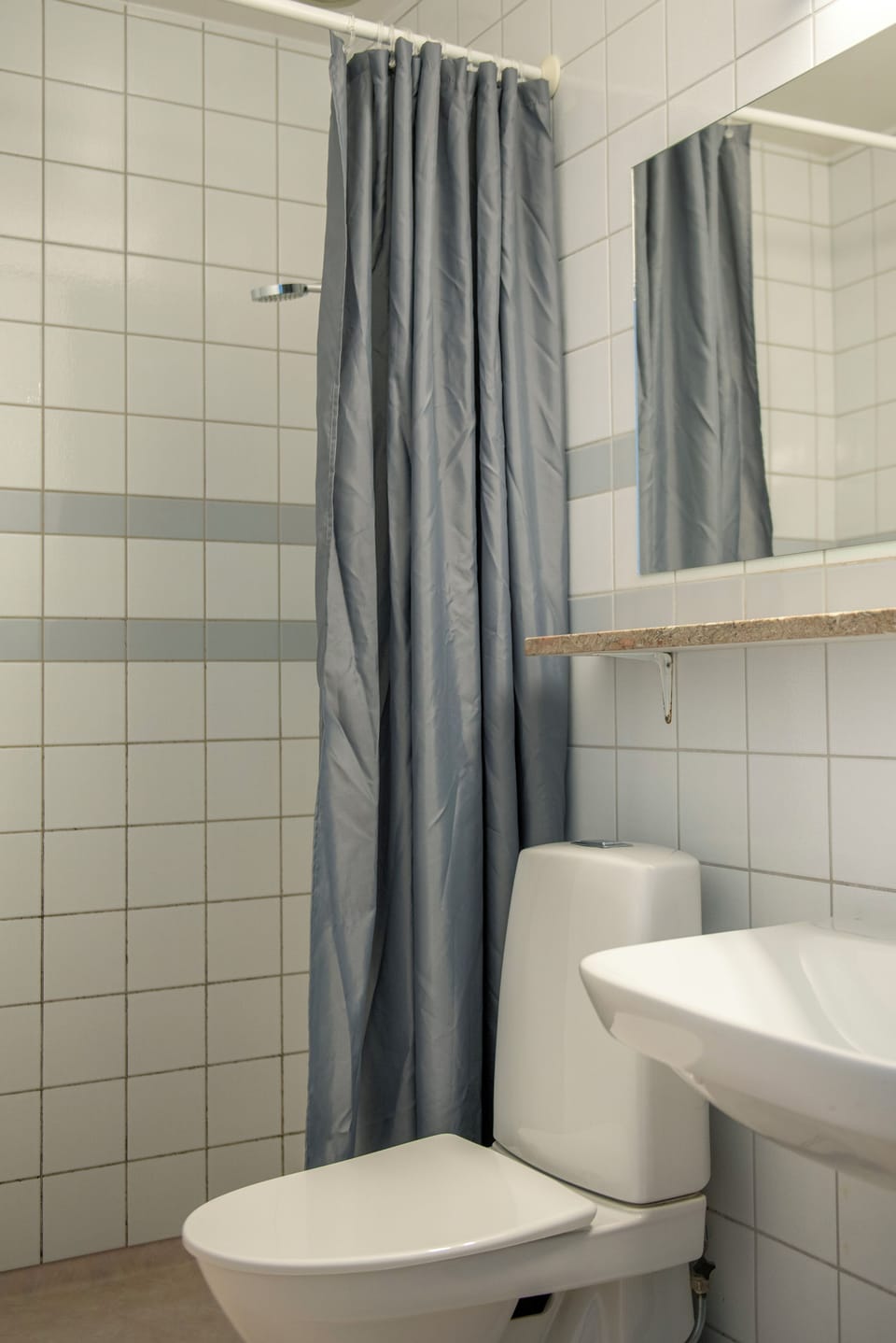 Shower, designer toiletries, hair dryer, towels